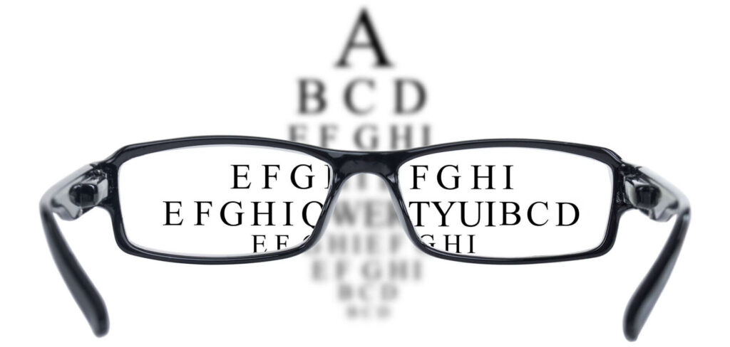 Eye Glasses on top of an Eye Exam